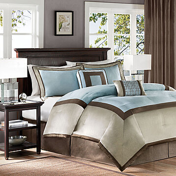 https://cdn1.ykso.co/boudoir-bedding-and-linen/product/madison-park-genevieve-7-piece-comforter-set-california-king-blue-eeed/images/ae376ce/1680190974/feature-phone.jpg