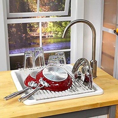 https://cdn1.ykso.co/premier-appliance/product/curtis-stone-roll-up-drying-rack-and-trivet/images/38810fd/1500588036/ample.jpg
