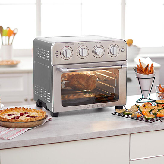 https://cdn1.ykso.co/premier-appliance/product/wolfgang-puck-1700-watt-23-liter-air-fryer-oven-with-rotisserie/images/6a54d0a/1602600173/generous.jpg