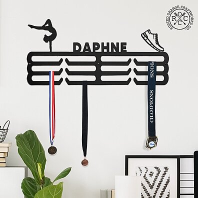 https://cdn1.ykso.co/rustedorangecraftworksco/product/multi-sport-medal-hanger-display-medal-holder-rack-for-awards-or-ribbons-fd52/images/523dbb6/1692901767/ample.jpg