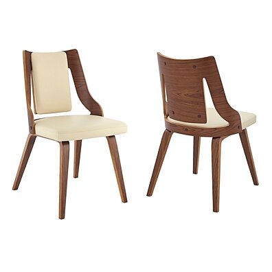 https://cdn1.ykso.co/wildorchid/product/aniston-cream-faux-leather-and-walnut-wood-dining-chairs-set-of-2-saltoro-sherpi/images/9758fc4/1626961608/ample.jpg